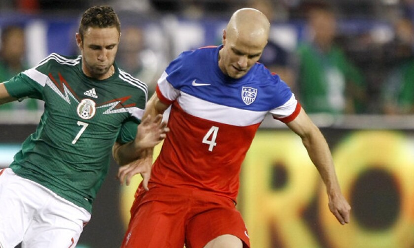 Mexico defenseman Miguel Mayun, left, and U.S. midfielder Michael Bradley compete for the ball during an international friendly match on Wednesday. Bradley dominated play in the first half of the game following a formation change by U.S. Coach Juergen Klinsmann.