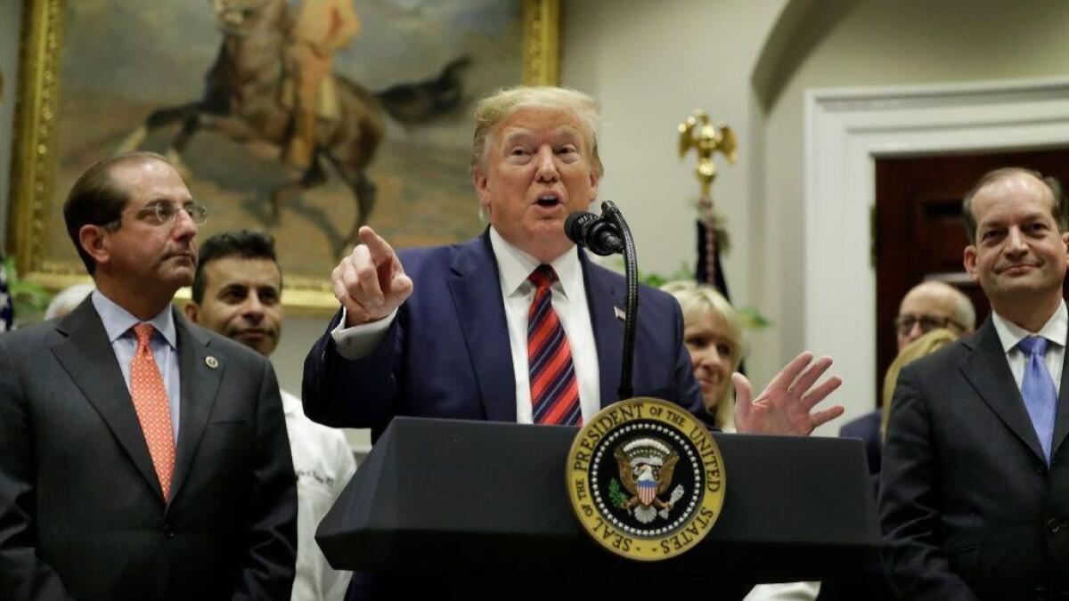 President Trump unveils his proposal on surprise medical billing in the Roosevelt Room of the White House Thursday.