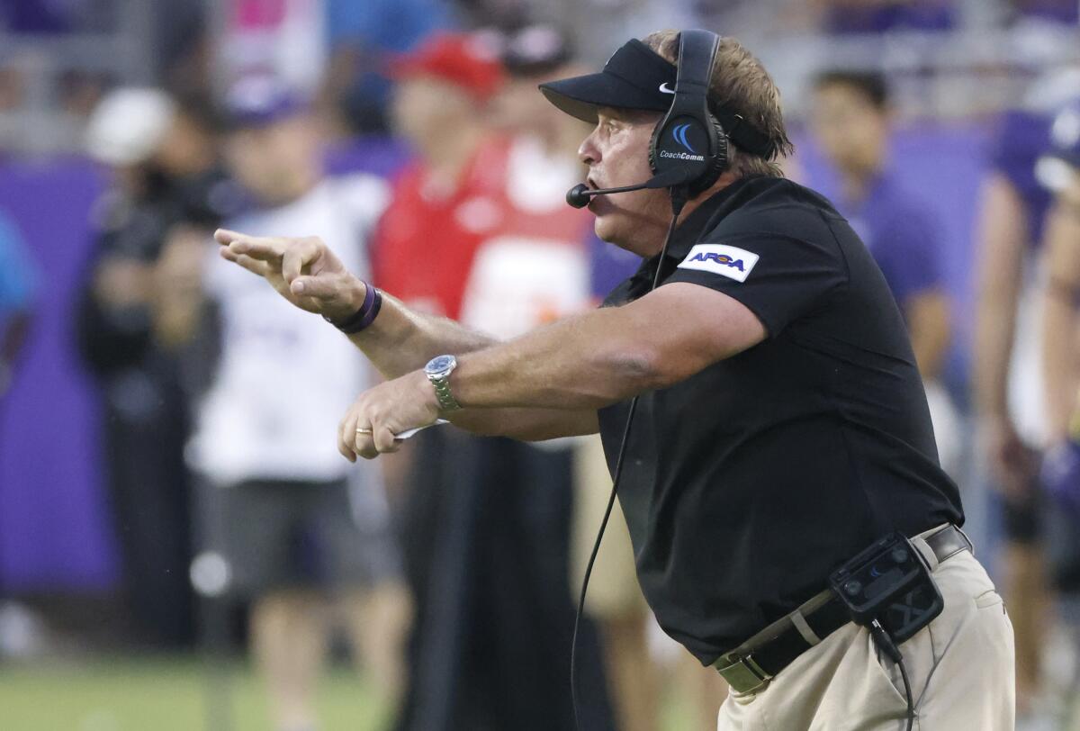 TCU head coach Gary Patterson calls a play against Duquesne during the second half of an NCAA college football game Saturday, Sept. 4, 2021, in Fort Worth, Texas. (AP Photo/Ron Jenkins)