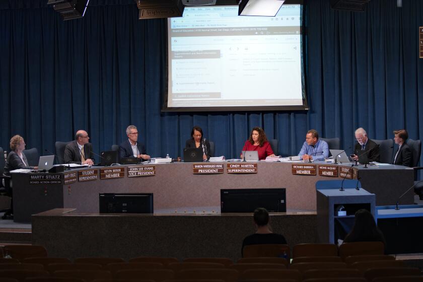 APRIL 23, 2019, SAN DIEGO, CALIFORNIA Kevin Beiser (second from left), was present for San Diego Unified School District board meeting held on Tuesday. (Nelvin C. Cepeda/The San Diego Union-Tribune)