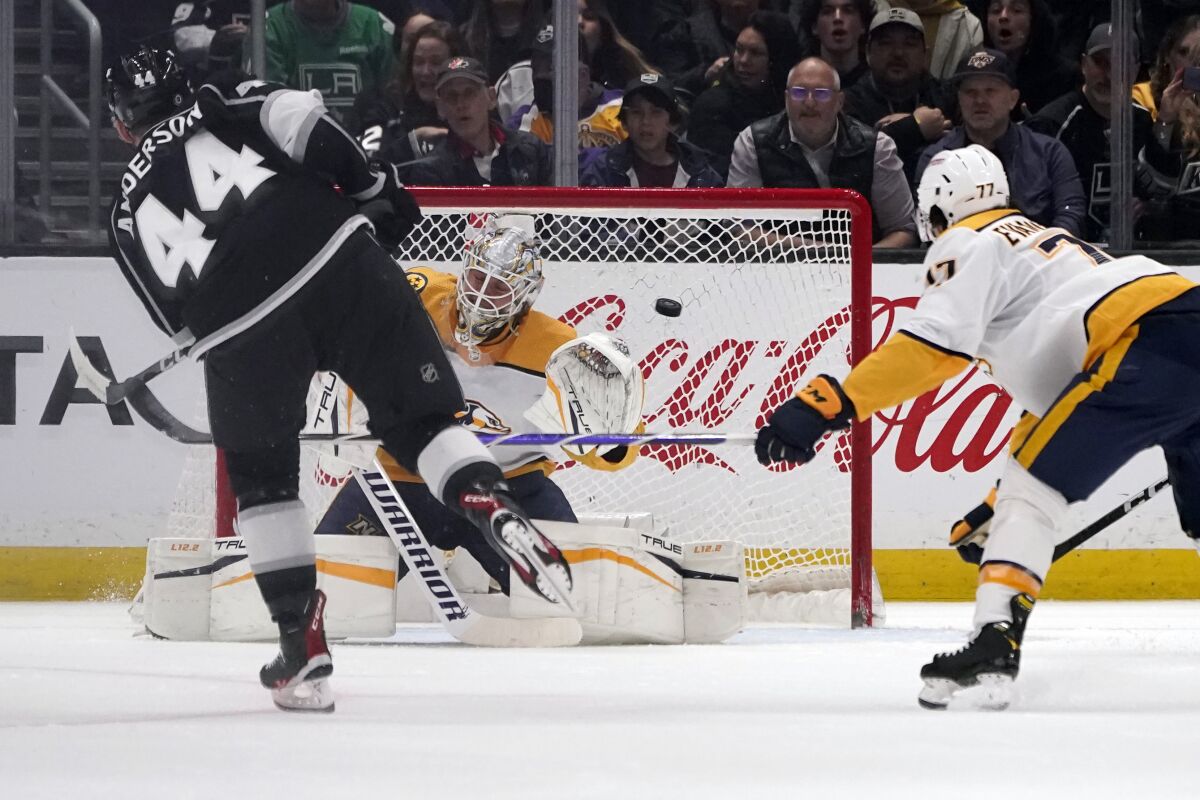 Kings defenseman Mikey Anderson (44) scores past Predators goaltender Kevin Lankinen during the first period March 11, 2023.