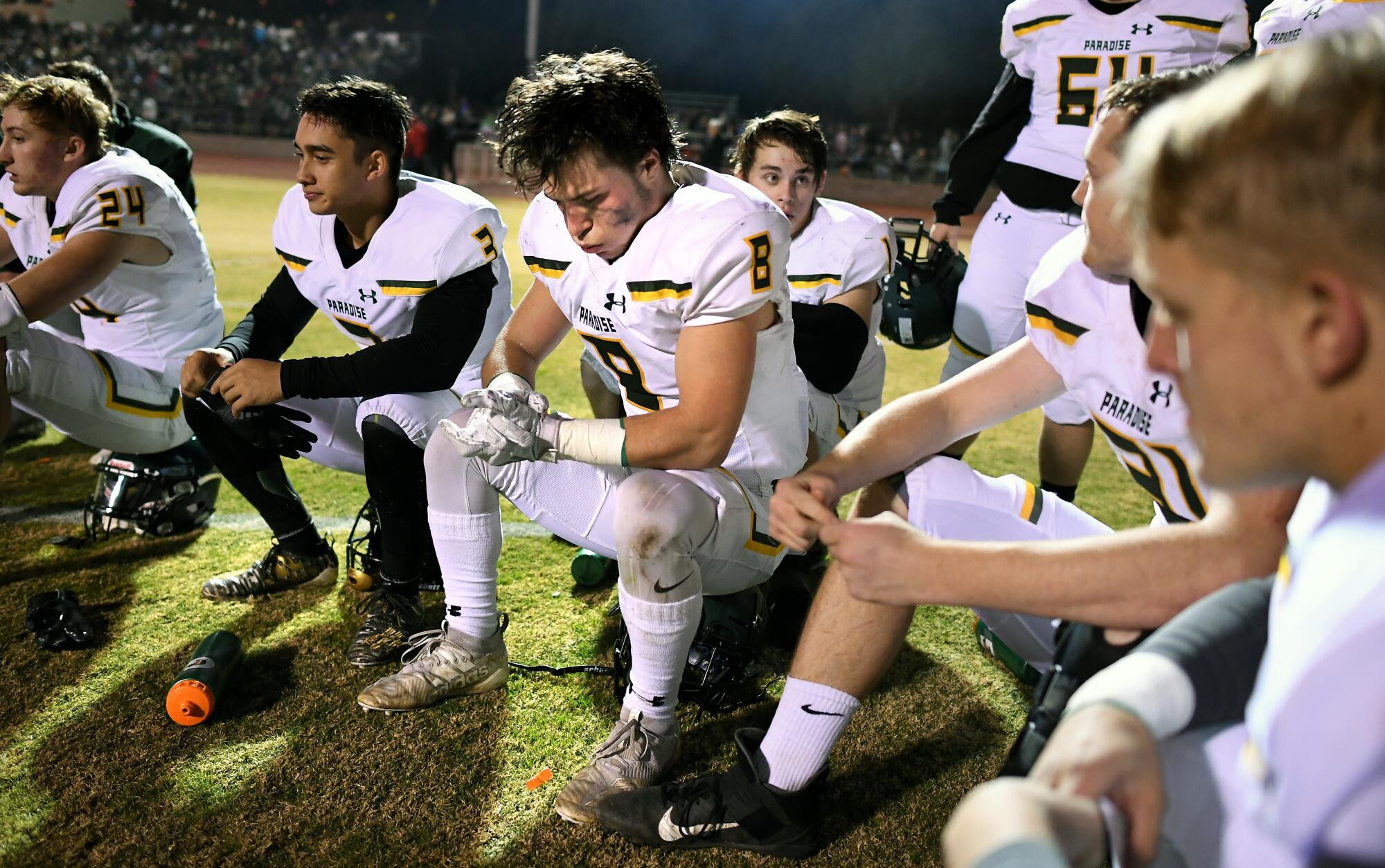Paradise's Brenden Moon (8) takes a break at halftime.