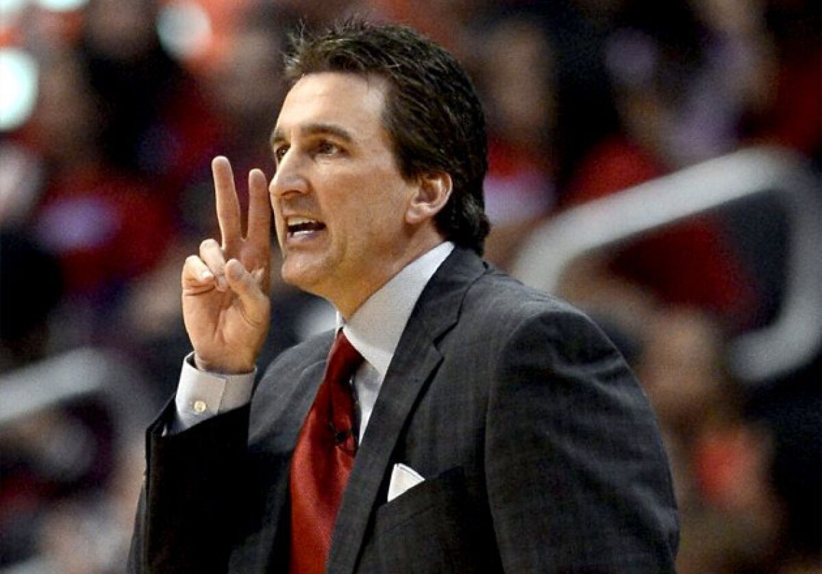 Clippers Coach Vinny Del Negro signals his players during a game against the Memphis Grizzlies.