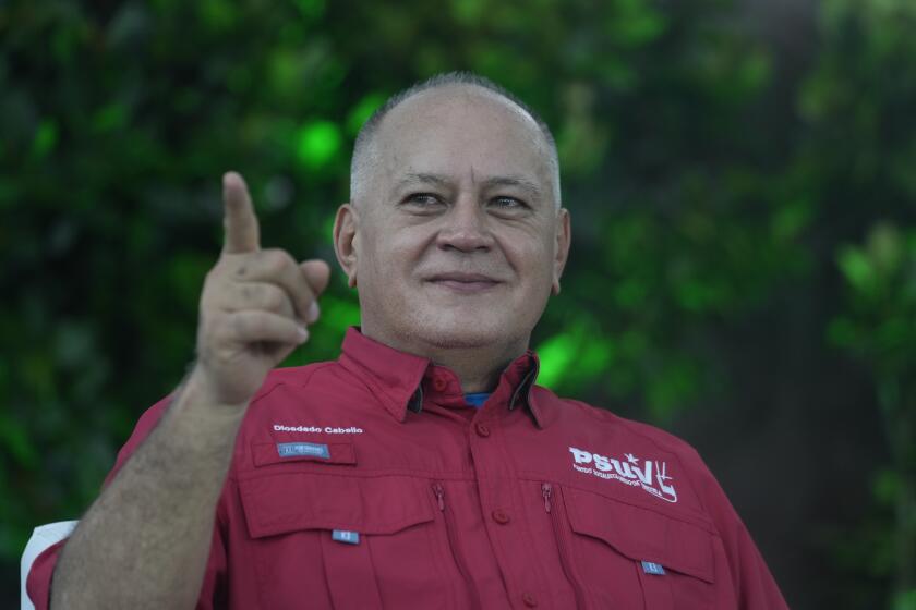 El ministro del Interior de Venezuela, Diosdado Cabello, hace un gesto durante un acto por el 16º aniversario de la Juventud Socialista Unida de Venezuela en Caracas, Venezuela, el jueves 12 de septiembre de 2024. (Foto AP/Ariana Cubillos)