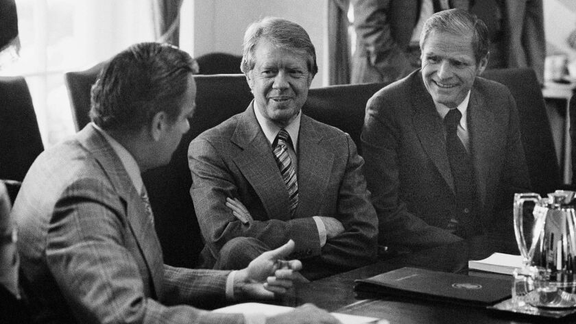 President Jimmy Carter attends a meeting at the White House in Washington on April 16, 1977.