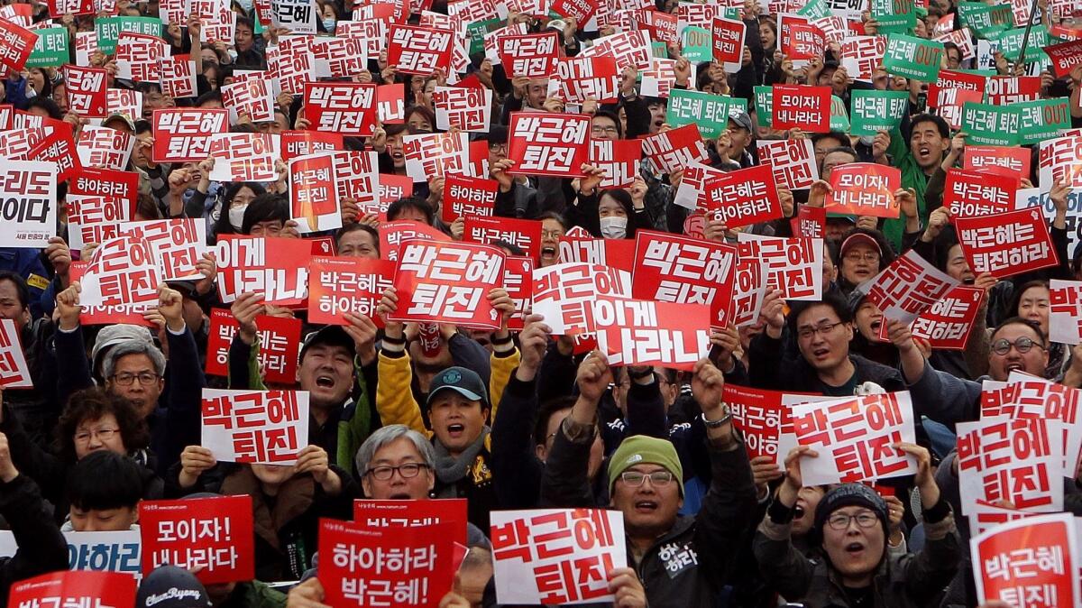 Thousands of South Koreans rally in Seoul to demand that President Park Geun-hye step down.