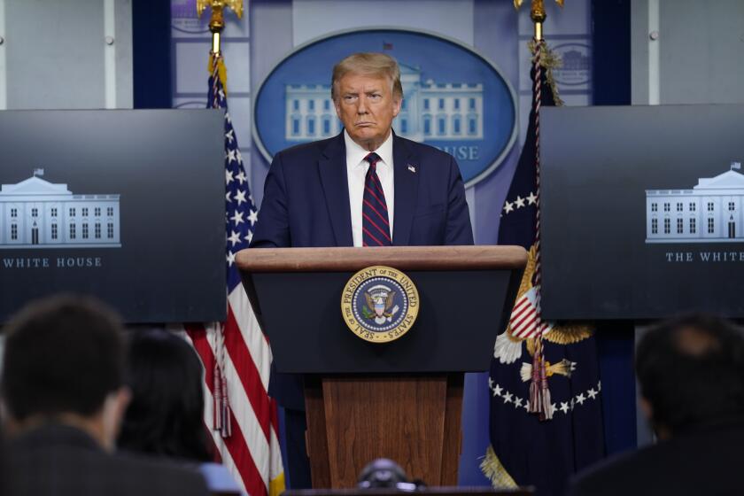 President Donald Trump listens during a news conference at the White House, Tuesday, July 21, 2020, in Washington. (AP Photo/Evan Vucci)
