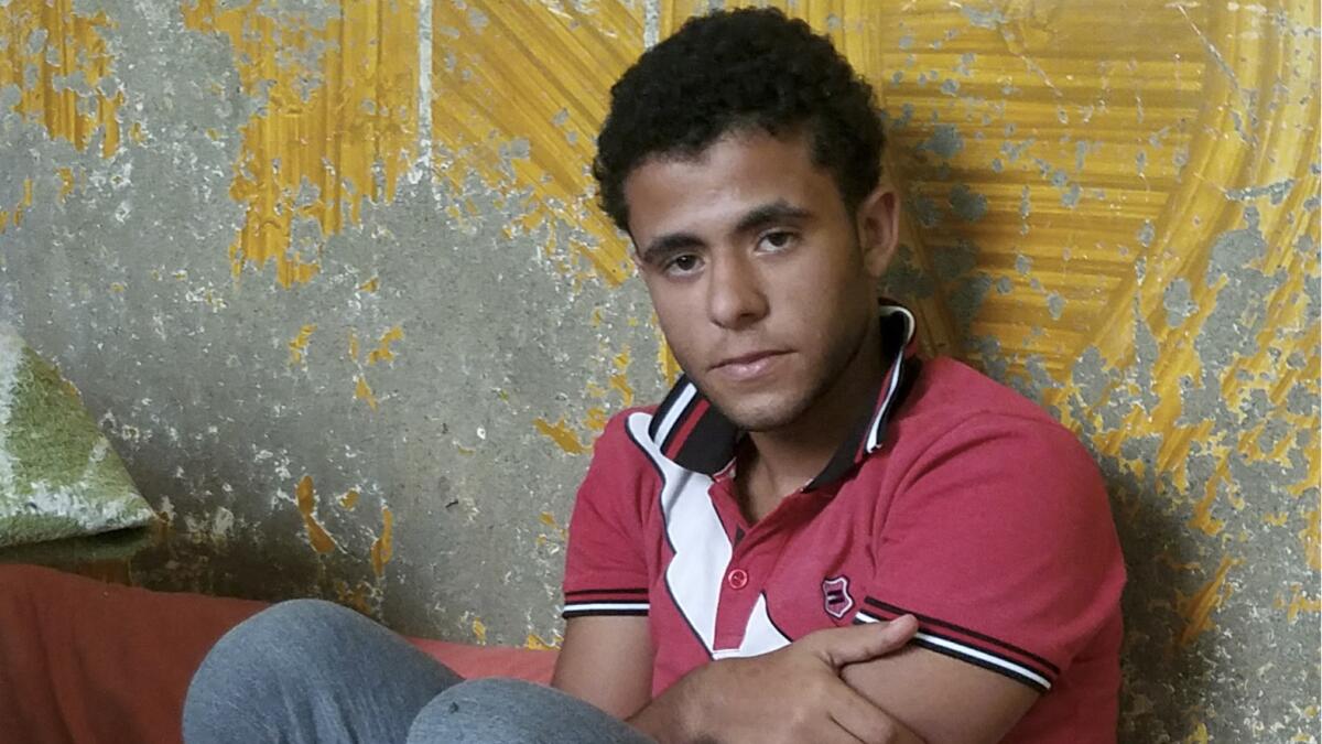 Attia Abdu Qamary, 17, survived the shipwreck off Egypt's north coast on Sept. 21, 2016, but 40 other youths from his northern Egyptian village of Green Island died trying to reach Italy.