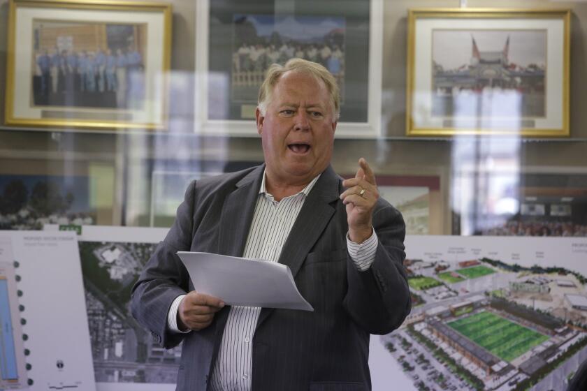 FILE - Real Salt Lake owner Dell Loy Hansen presents his vision for a new minor league soccer stadium on Sept. 10, 2014, in Salt Lake City. Hansen has come under criticism for comments he made on a radio show after RSL players decided not to take the field for a match to protest racial injustice. (AP Photo/Rick Bowmer, File)