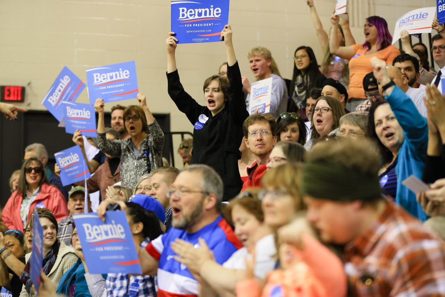Bernie Sanders supporters rally at Bryan High School in Bellevue, Neb., to celebrate their candidate's victory in the state's Democratic caucuses.