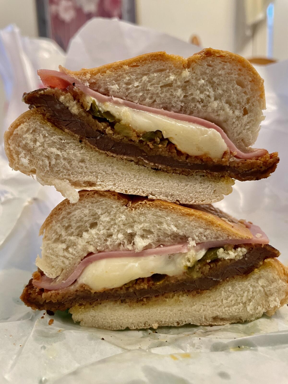 Close-up of a sandwich cut in half.