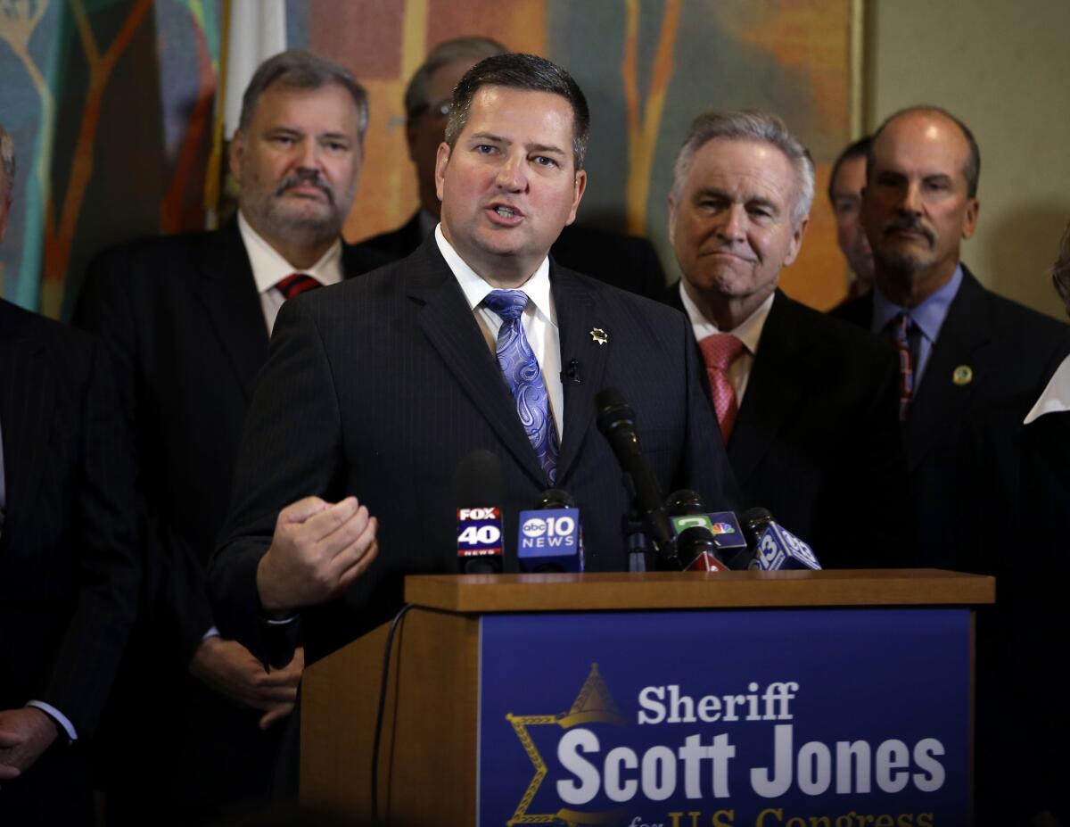 Sacramento County Sheriff Scott Jones announces his candidacy for California's 7th Congressional District seat during a news conference Monday.