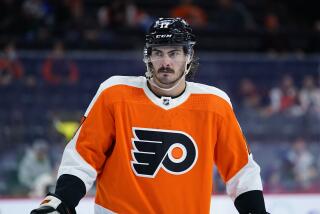 Philadelphia Flyers' Zack MacEwen plays during a preseason NHL hockey game.