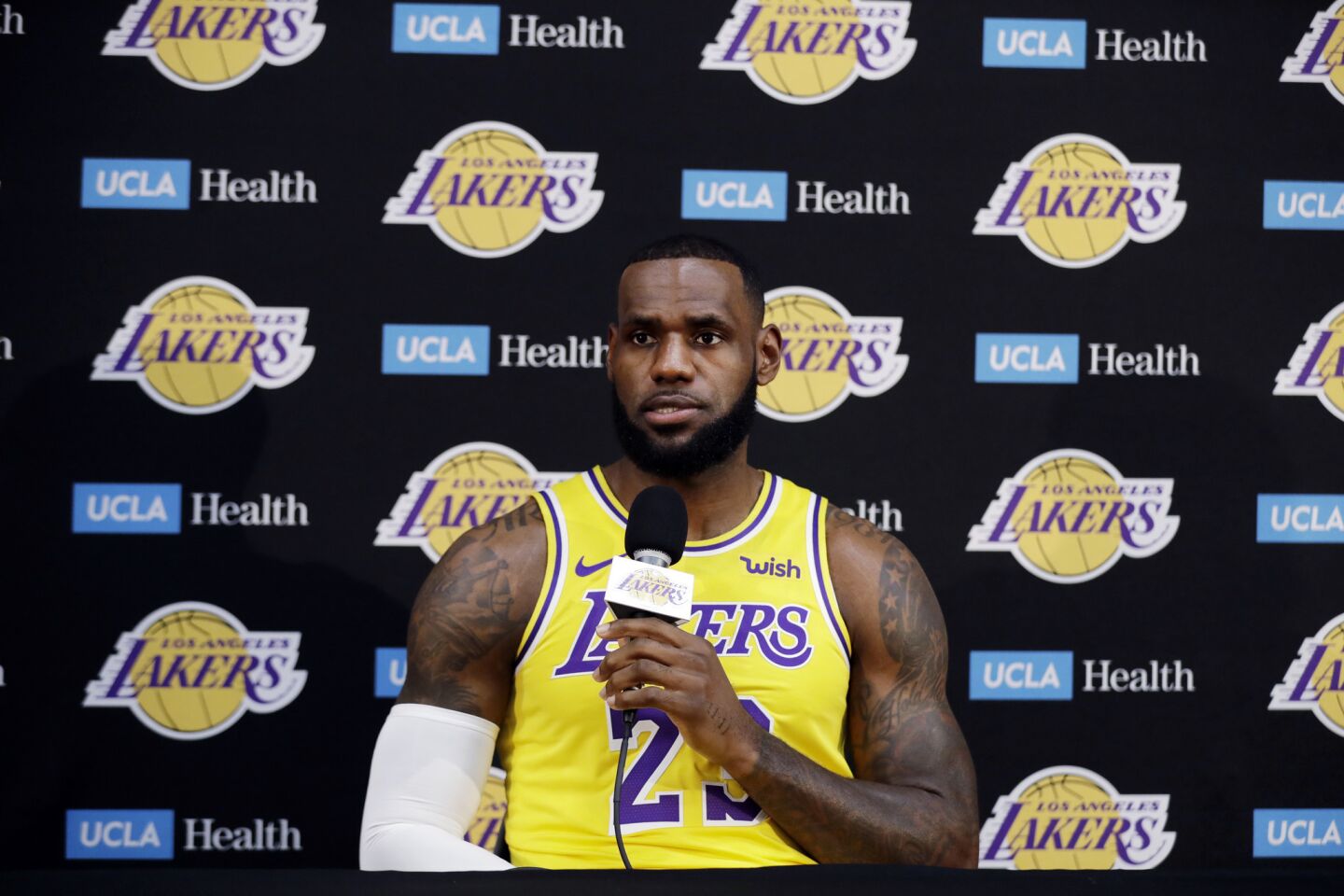 Los Angeles Lakers' LeBron James fields questions during media day at the NBA basketball team's practice facility Monday, Sept. 24, 2018, in El Segundo, Calif. (AP Photo/Marcio Jose Sanchez)