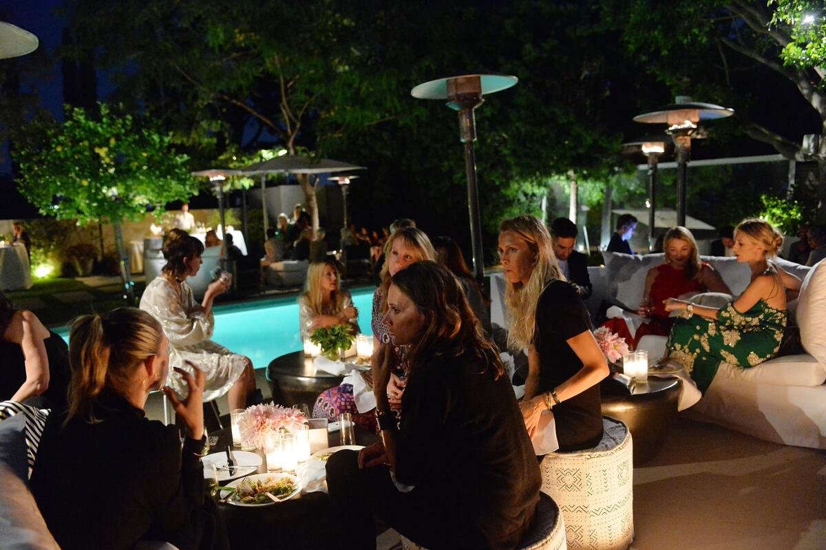 Guests attend Net-a-Porter's dinner party to celebrate designer Rachel Zoe's capsule collection.
