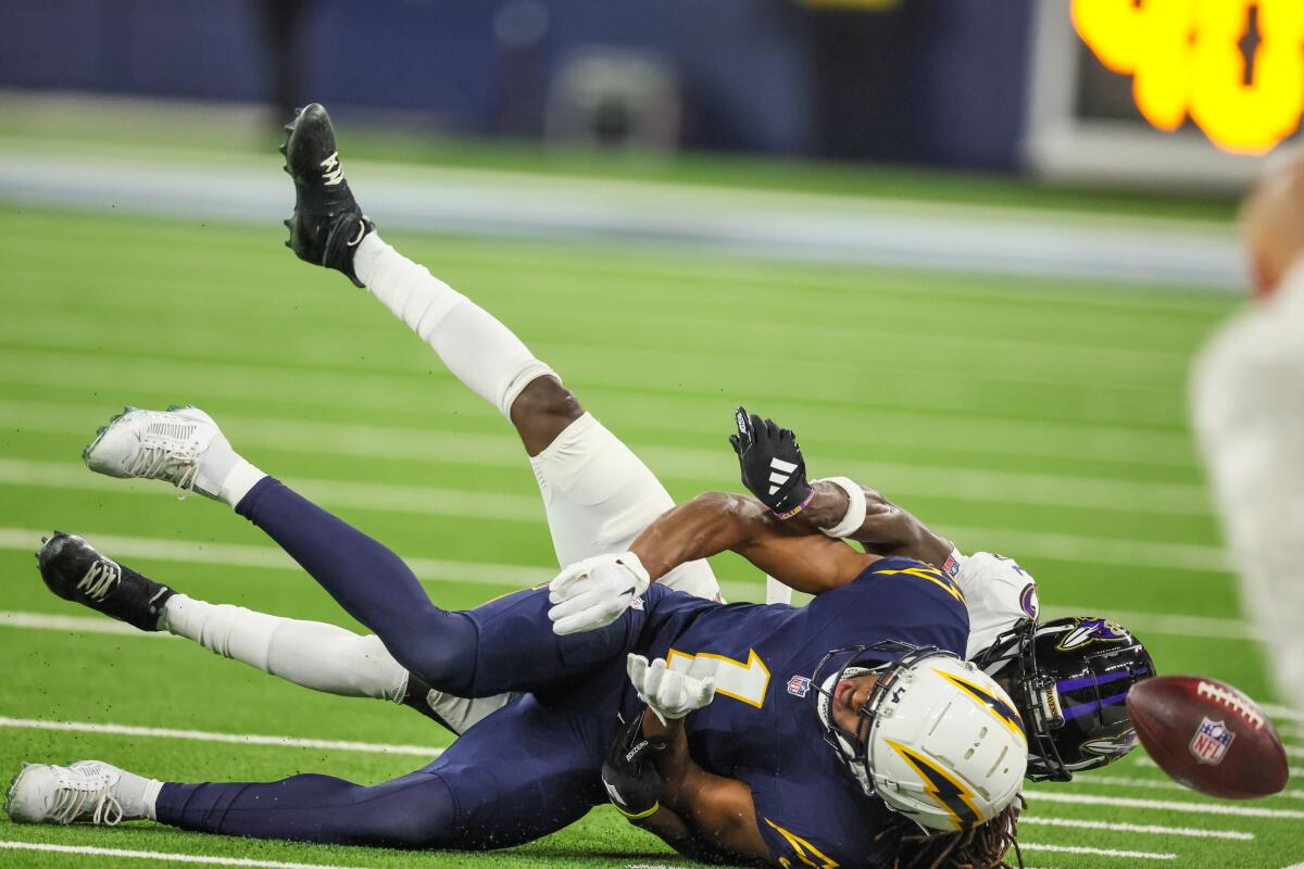 Chargers wide receiver Quentin Johnston (1) can't hold on to this pass late in the game against the Ravens.