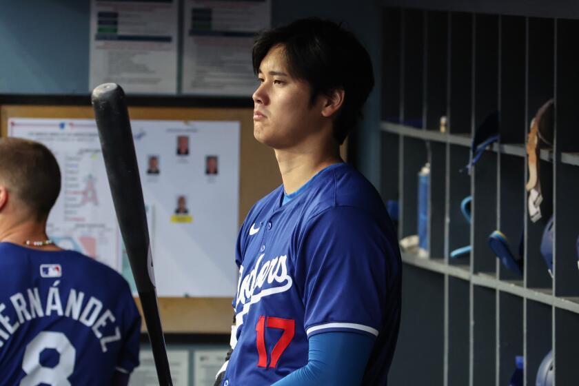 Los Angeles, CA - March 25: Shohei Ohtani gets ready to bat during the Los Angeles Dodgers.