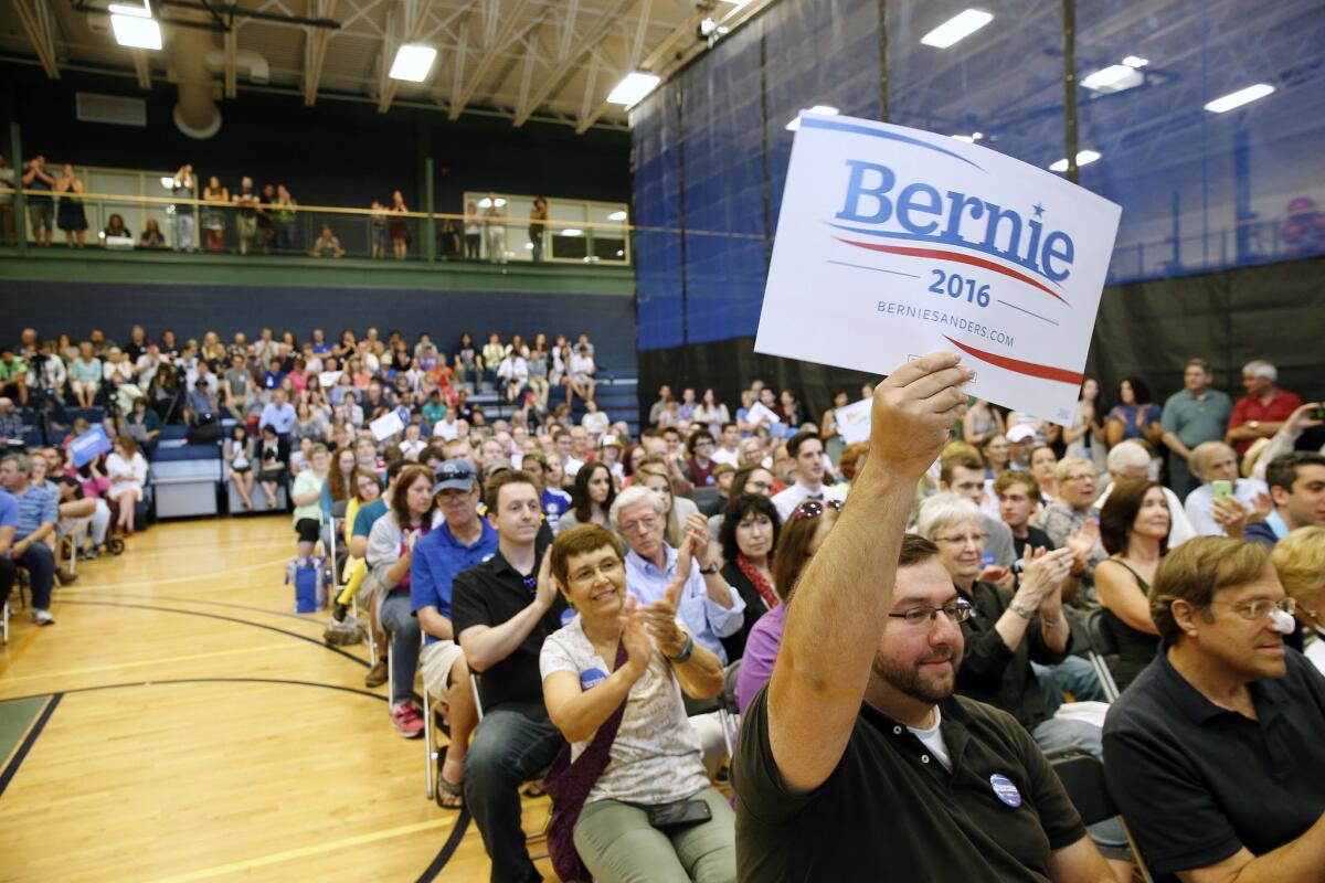 Supporters fill a town hall meeting for Democratic presidential candidate Sen. Bernie Sanders of Vermont at Nashua Community College in Nashua, N.H., on June 27.