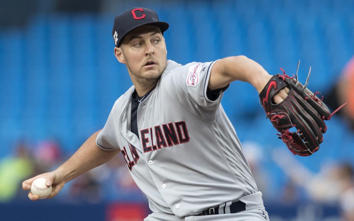 Trevor Bauer delivers for the Cleveland Indians against the Toronto Blue Jays on July 23. Bauer was traded to the Cincinnati Reds on Tuesday.