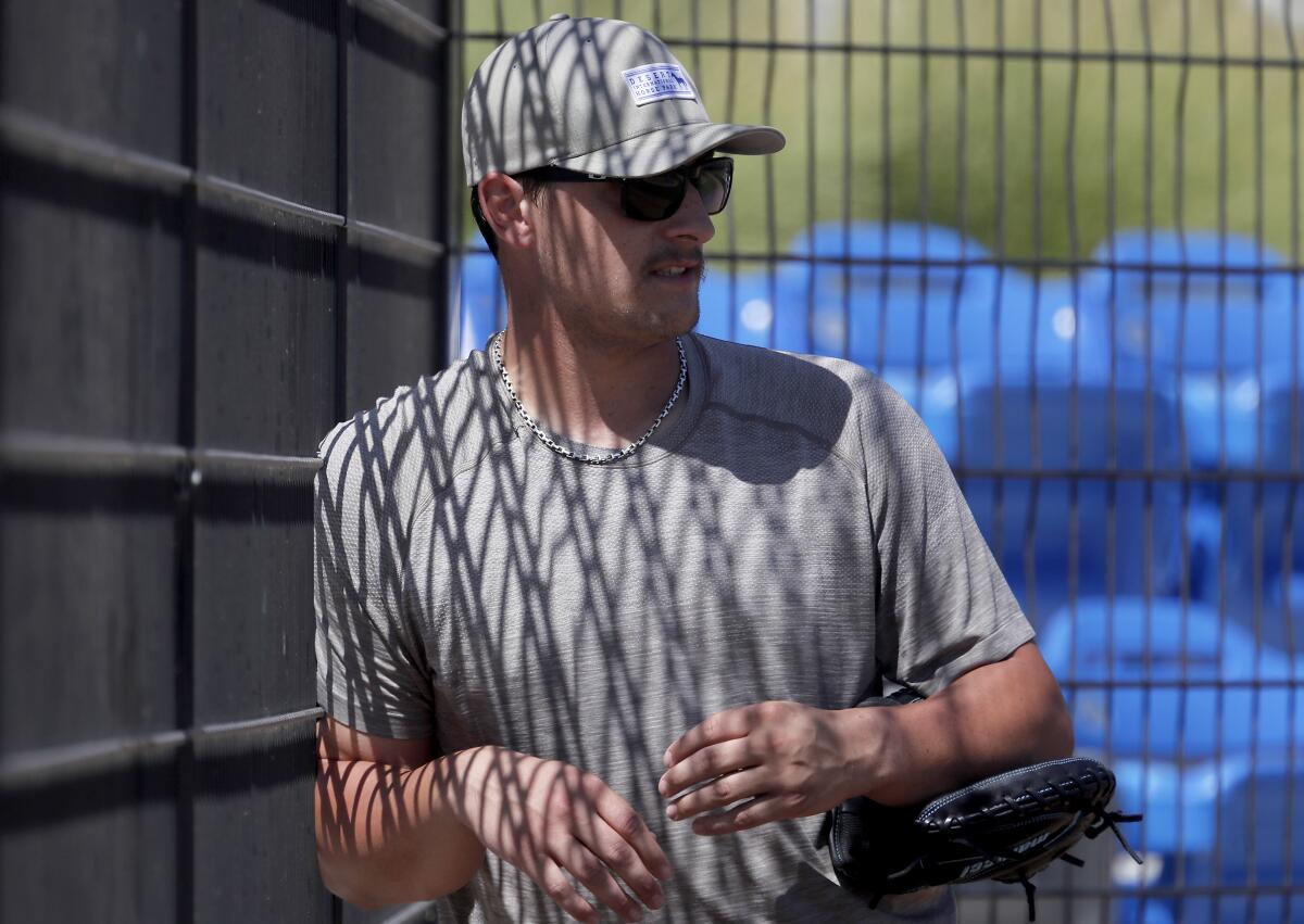 Chris Betts watches players gathered for workouts at the Great Park in Irvine on July 8.