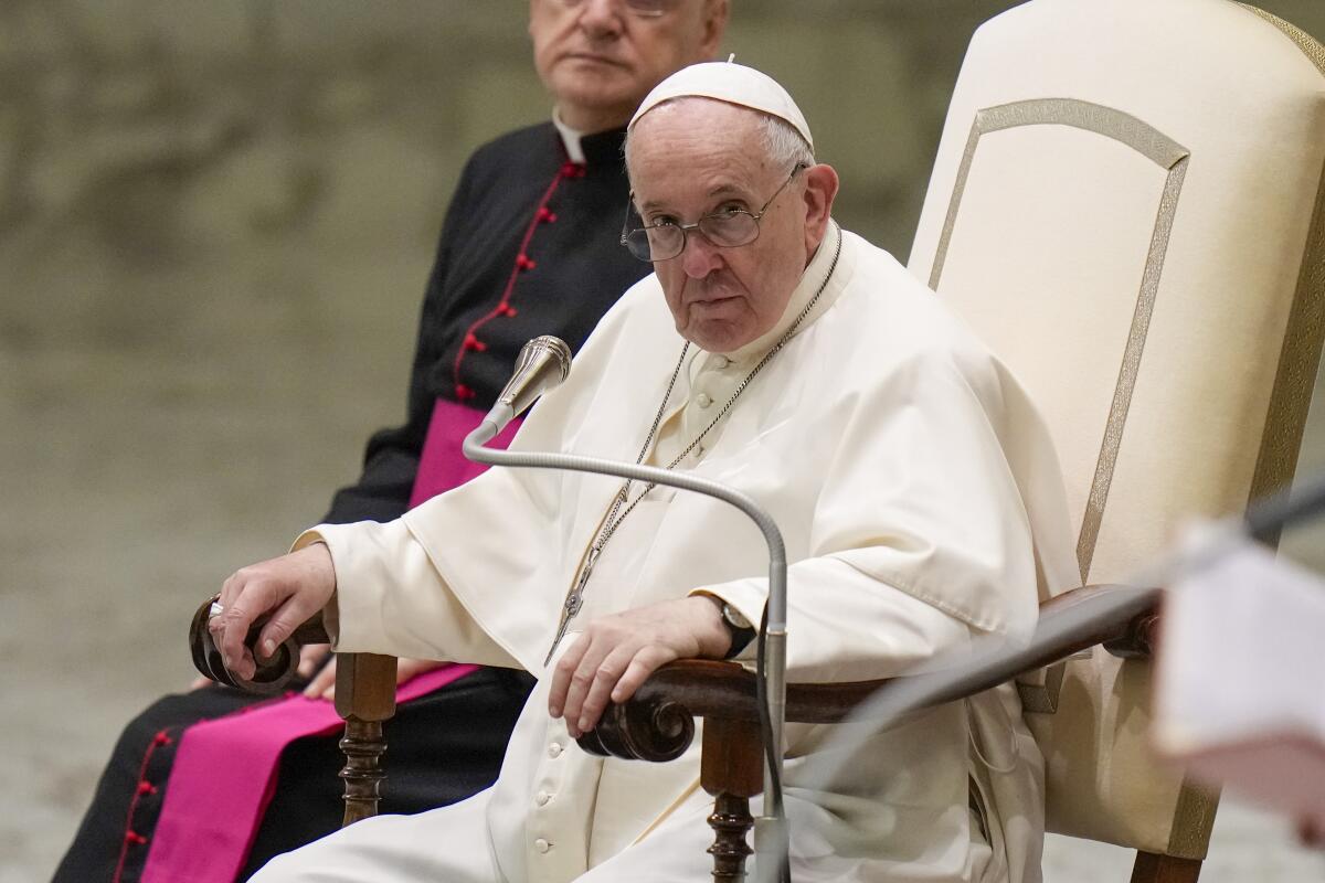 Pope Francis seated