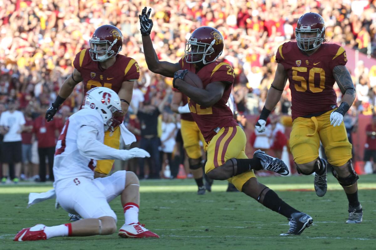 USC's Justin Davis cuts past Stanford's Dallas Lloyd on Sept. 19.