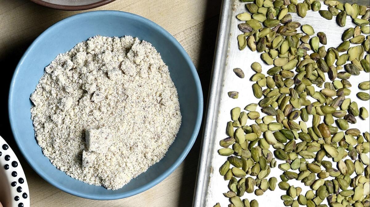 Toasted ground pistachios and toasted chopped pistachios.
