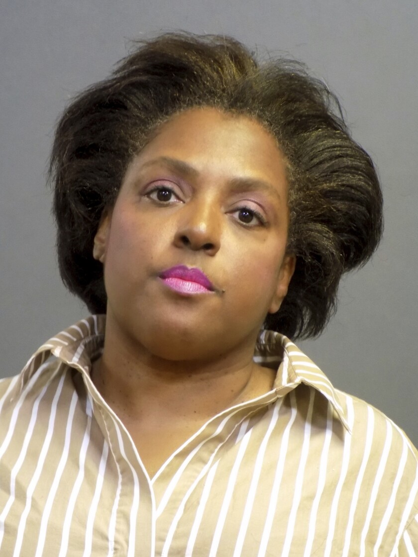 This undated photo provided by the Costa Mesa, Calif., Police Department shows Karen Yvonne Floyd, 54, of Newport Beach, Calif. Police arrested Floyd on Monday, Jan. 13, 2020, after she pulled a large kitchen knife on staff at a jewelry store and stole $2 million worth of their merchandise after trying on multiple high-end pieces and walking out of the store wearing them. (Costa Mesa Police Department via AP)