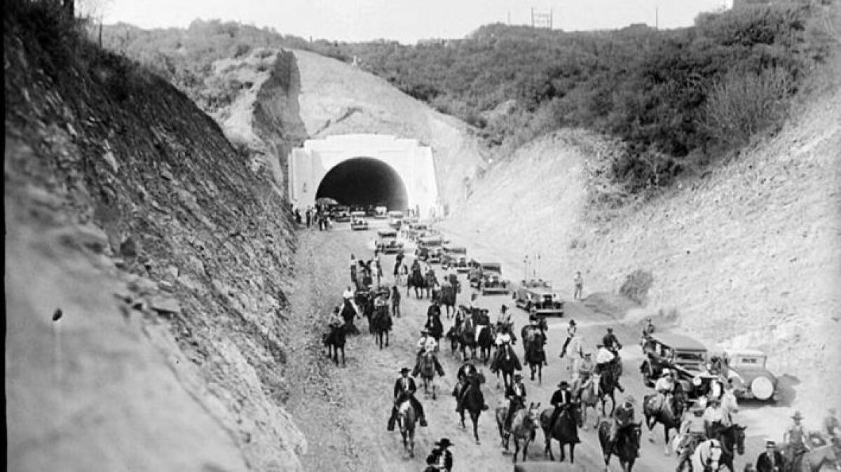 Sep. 27, 1930: A dedication procession emerges from the new Sepulveda Boulevard tunnel.