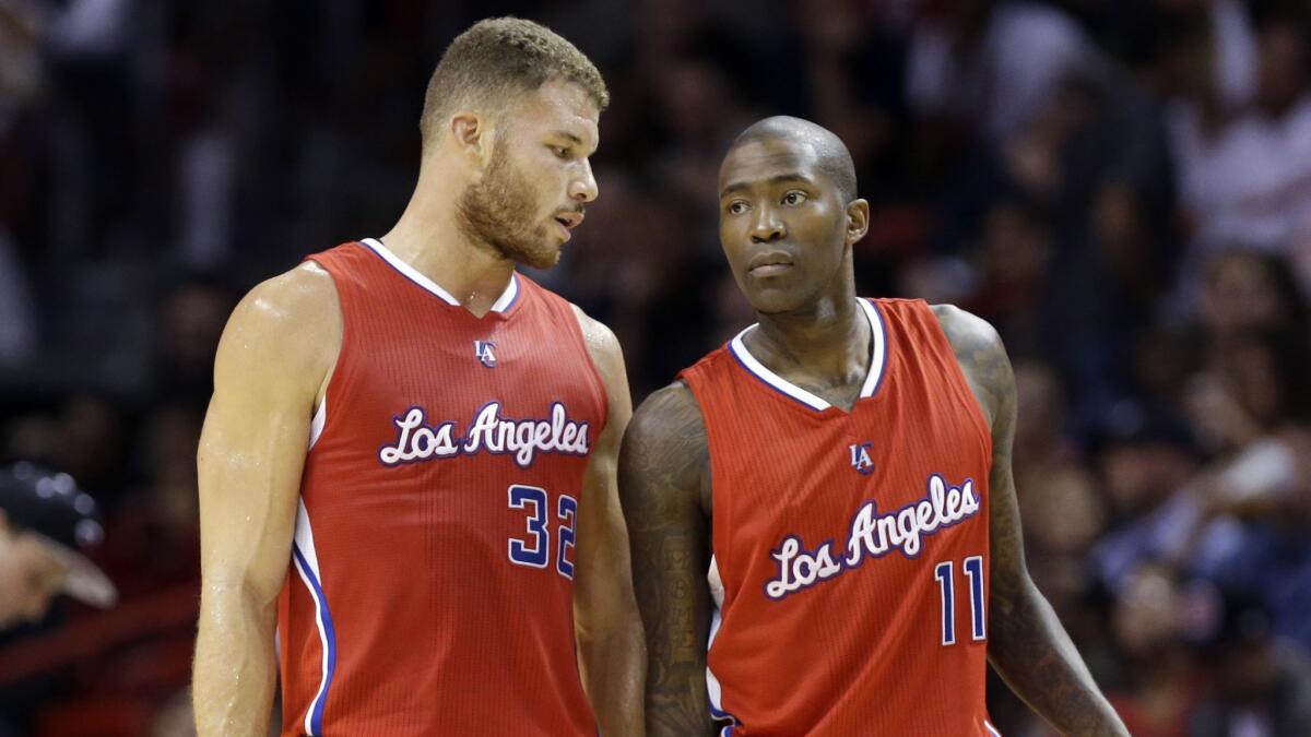 Clippers forward Blake Griffin, left, speaks to teammate Jamal Crawford during a win over the Miami Heat last week.