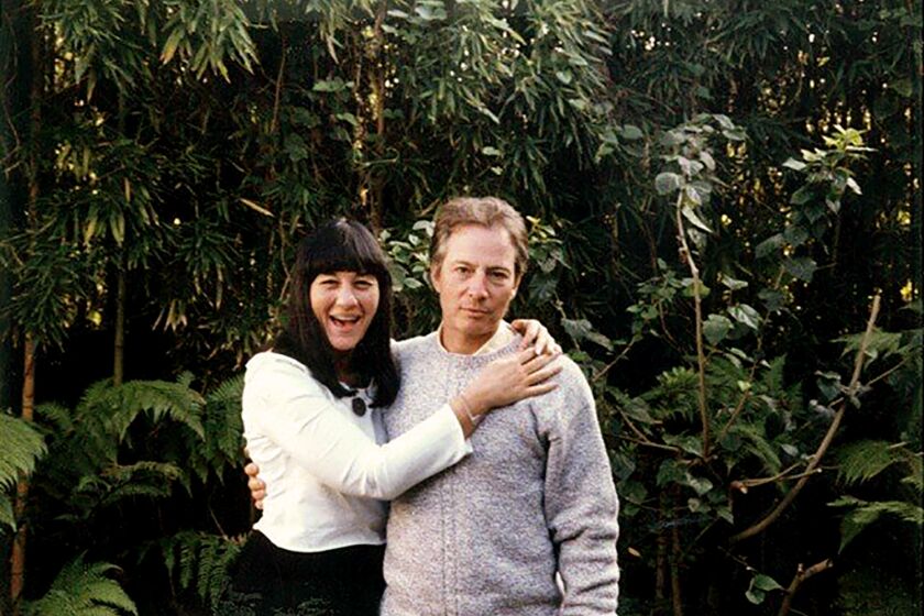 Susan Berman with her friend Robert Durst, who is on trial for her 2000 killing.