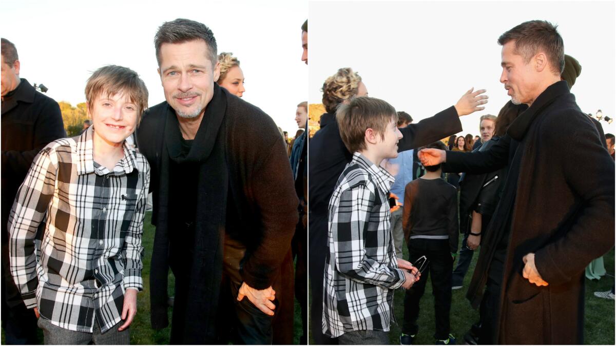 Brandon Joseph, left, is joined by Brad Pitt and a group of celebrities during Saturday's benefit event for the Epidermolysis Bullosa Medical Research Foundation.