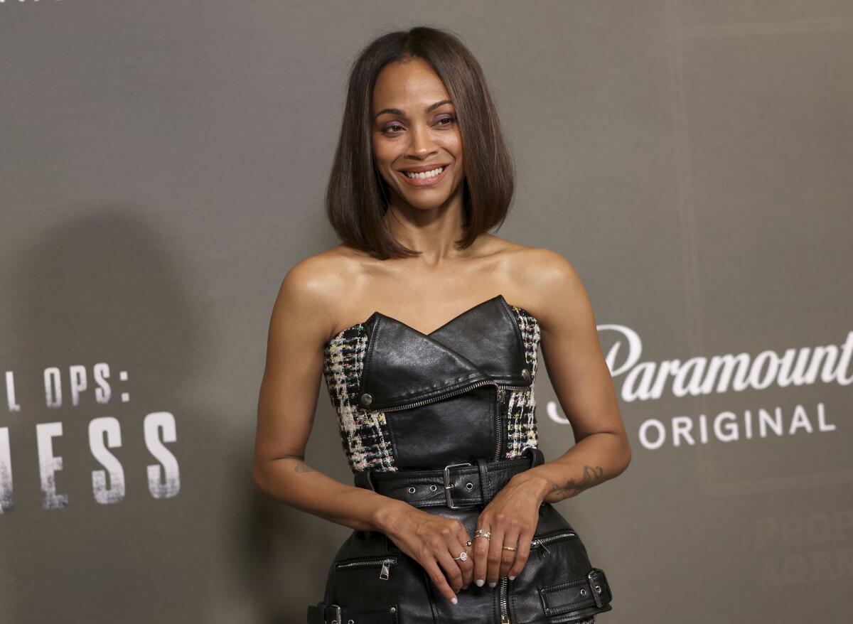 FILE - Zoe Saldana appears at the premiere of the Paramount+ series "Special Ops: Lioness" in London on July 11, 2023. Saldana stars in a new Taylor Sheridan series about an elite, undercover group of CIA agents. (Vianney Le Caer/Invision/AP, File)
