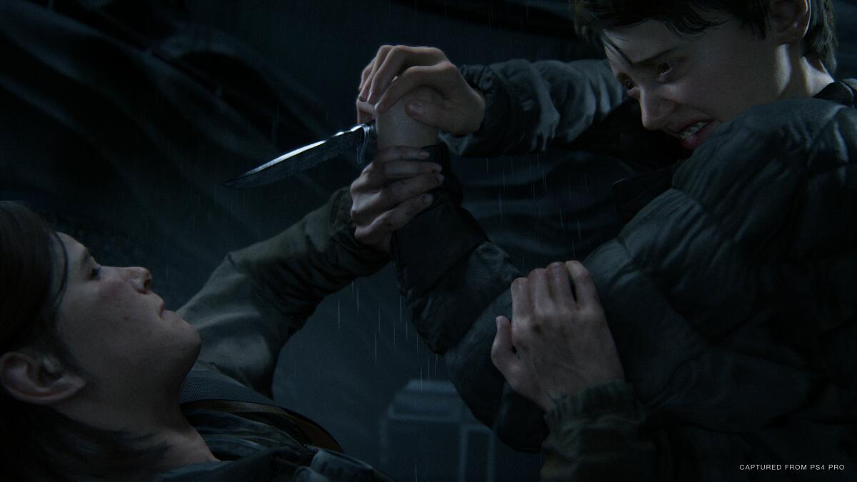 "The Last of Us Part II" does not hold back in showing difficult moments. Ellie, above, in a fight with Mel.