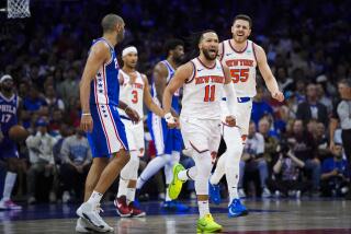 New York Knicks' Jalen Brunson (11) reacts during the second half of Game 6 in an NBA.
