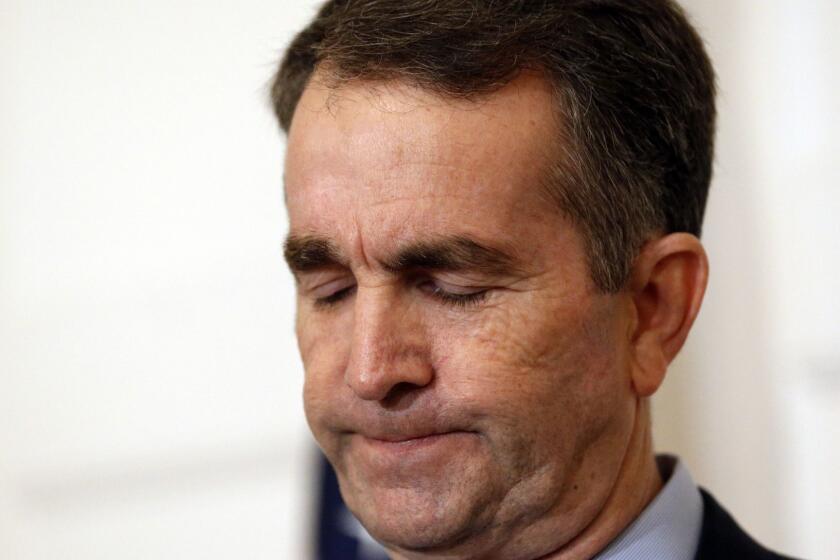 Virginia Gov. Ralph Northam pauses during a news conference in the Governor's Mansion in Richmond, Va., on Saturday, Feb. 2, 2019. Northam is under fire for a racial photo that appeared in his college yearbook. (AP Photo/Steve Helber)