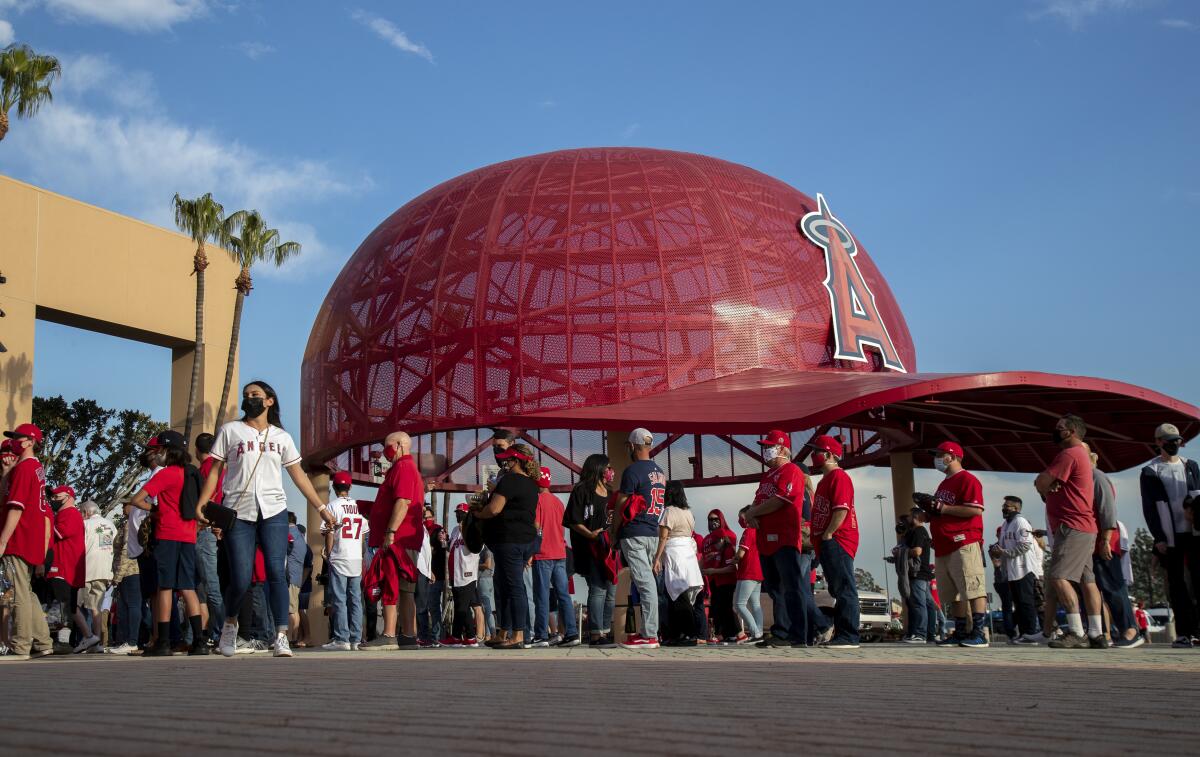 Fans line up to enter Angel Stadium for the Angels home opener against the Chicago White Sox on April 1.