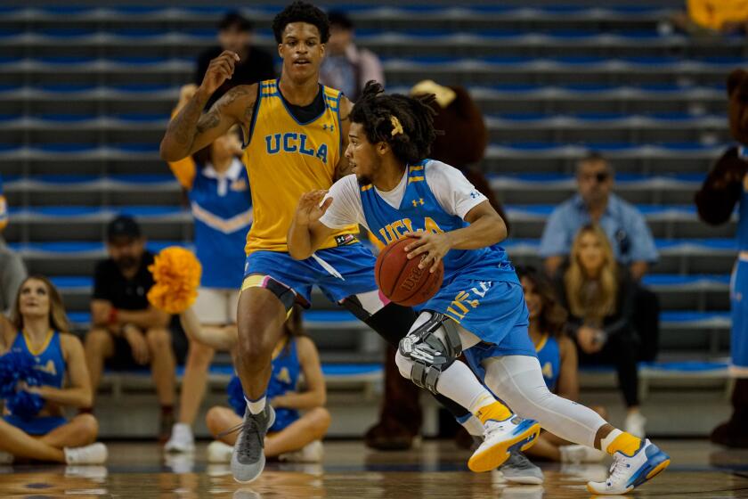 WESTWOOD, CALIF. - OCTOBER 23: UCLA Bruin Tyger Campbell (1) drives to the basket during a preseason showcase at Pauley Pavillion on Wednesday, Oct. 23, 2019 in Westwood, Calif. (Kent Nishimura / Los Angeles Times)