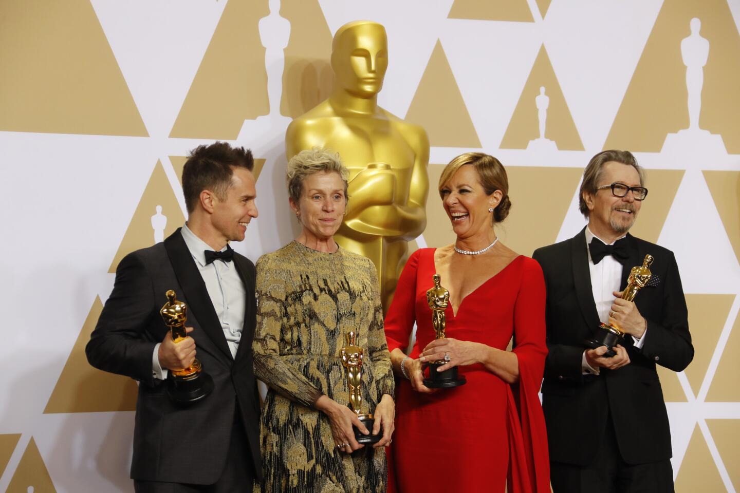The four acting winners, from left, Sam Rockwell, supporting actor for "Three Billboards Outside Ebbing, Missouri," Frances McDormand, lead actress for "Three Billboards," Allison Janney, supporting actress for "I, Tonya" and Gary Oldman, lead actor for "Darkest Hour."