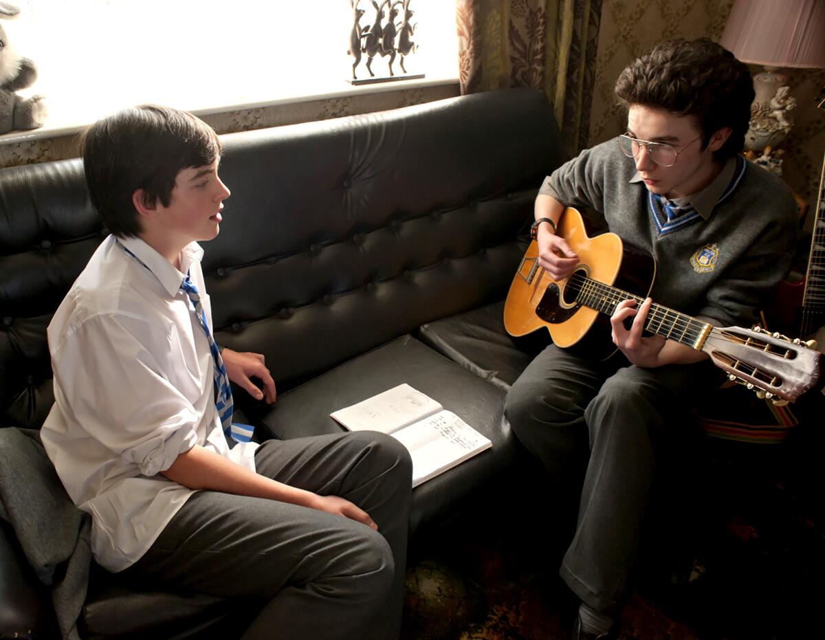 Ferdia Walsh-Peelo as Cosmo, left, and Mark McKenna as Eemon in “Sing Street.”