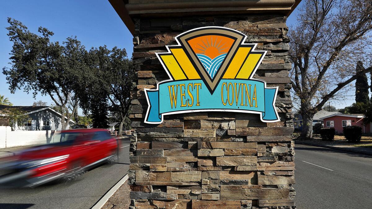 A motorist travels along Glendora Avenue in West Covina.