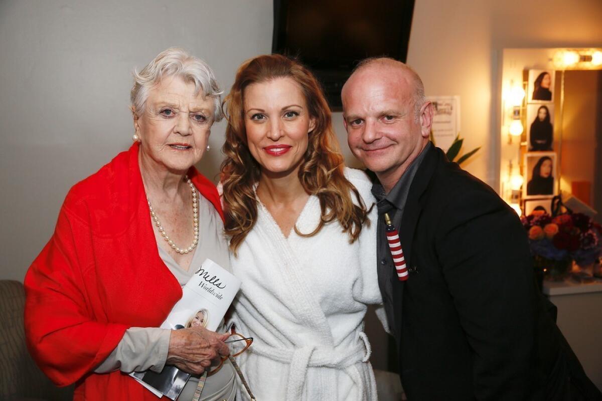 Angela Lansbury poses with 'Grey Gardens' cast member Rachel York and the musical's director Michael Wilson backstage after the opening night performance of "Grey Gardens" at the Ahmanson Theatre on July 13.
