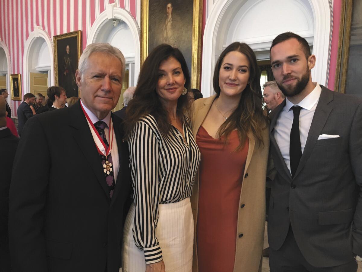 Alex Trebek receives the Order of Canada with his wife, Jean, daughter Emily and son Matthew.