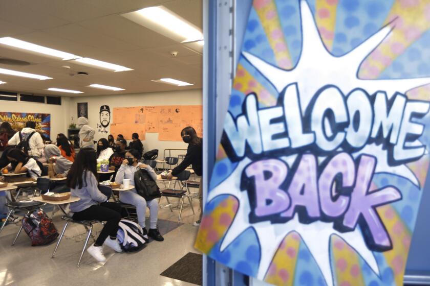 LYNWOOD, CA - OCTOBER 28, 2021 - - Students attend an English Pre-AP 9 class in a portable classroom at Lynwood High School - Bullis on October 28, 2021. Close to 1900 students are currently attending school at this campus since Lynwood High School - Imperial suffered a building collapse that happened in June 2020. Officials are still assessing the damage and impact of the construction failure on the local educational community. Lynwood High School, a relatively new flagship campus in the Lynwood Unified School District, was condemned as unsafe to use after further investigation proved some parts of the school structurally unsound.(Genaro Molina / Los Angeles Times)