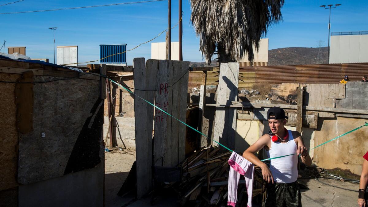Alexis Franco Santana lives on the Tijuana side of Otay Mesa, facing the existing border wall — and the new prototypes.