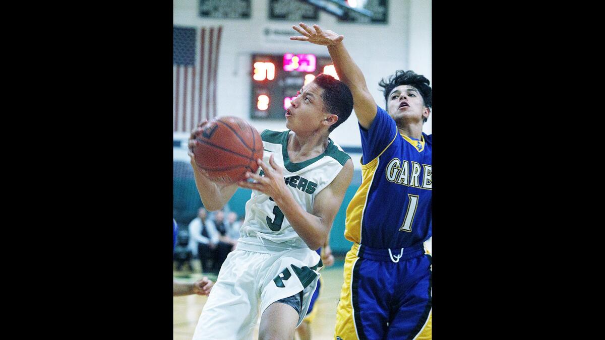 Providence High's Bryce Whitaker helped the Pioneers boys' basketball and boys' track and field teams to Prep League titles.