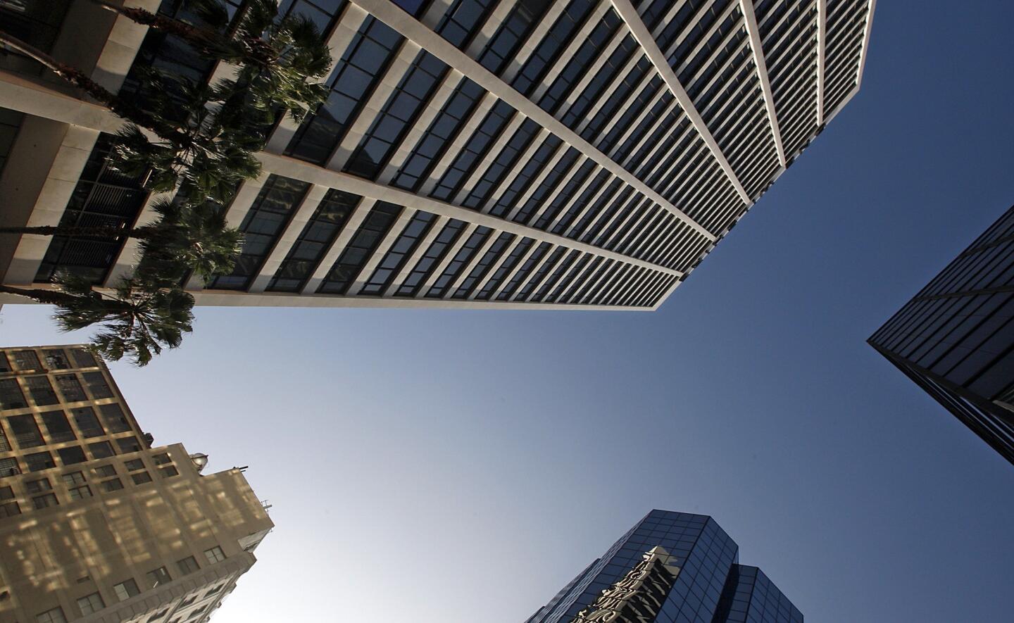 One Wilshire, shown at top, at the eastern end of Wilshire Boulevard may look like a typical office building, but it's actually what's known as a "telecom hotel," holding servers, routers and other equipment for telecommunications companies, Internet service providers and other digital firms.