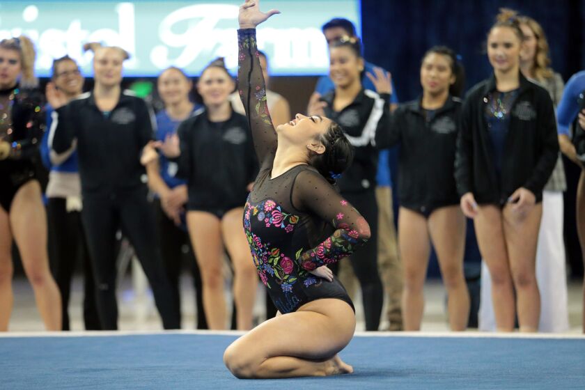 WESTWOOD, CA -- DECEMBER 14, 2019: Felicia Hano finishes her floor exercise during the UCLA gymnastics exhibition at Pauley Pavilion. (Myung J. Chun / Los Angeles Times)