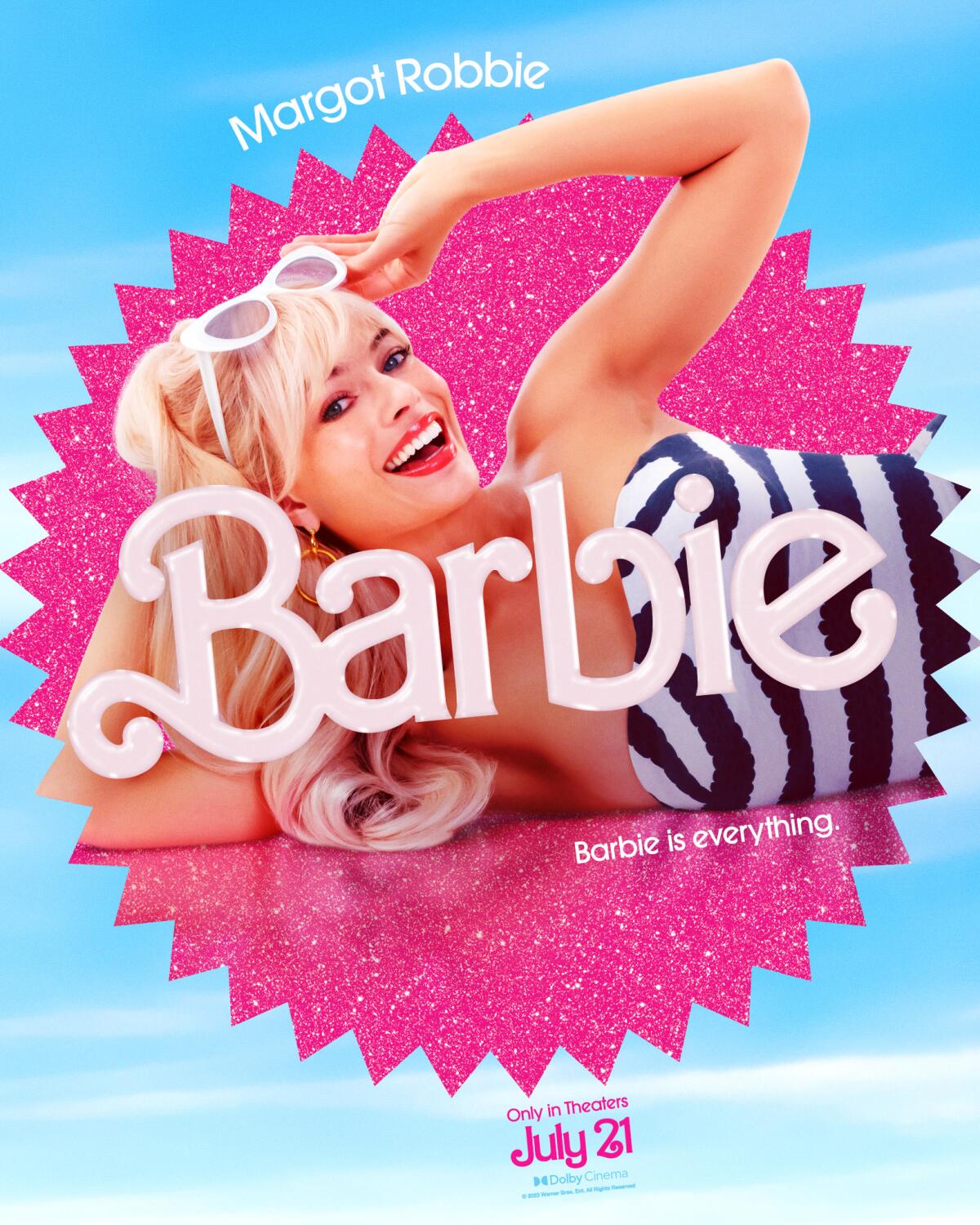 Margot Robbie lounges in a "Barbie" movie poster. She wears a black-and-white striped swimsuit and white sunglasses.