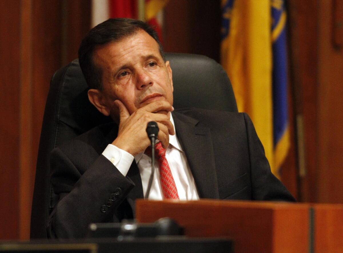Santa Ana Mayor Miguel Pulido, shown during a City Council meeting in September, was reelected.